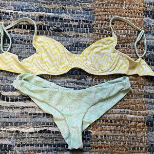 Moana Bikini, size small. Gently used. Bra tie back top and runch bottom.